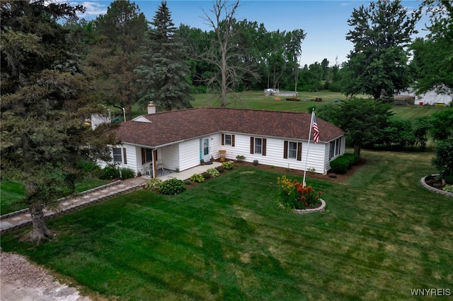 2610 Coomer Rd, Newfane, NY 14028 - single story home with a front yard and a chimney