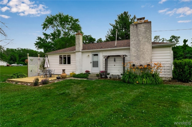 2610 Coomer Rd, Newfane, NY 14028 - back of house with a chimney, a yard, a patio, and entry steps
