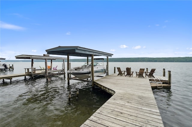 5041 Mapes Mathews Rd, Hector, NY 14818 - dock with boat lift and a water view