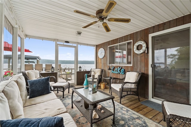 5041 Mapes Mathews Rd, Hector, NY 14818 - sunroom / solarium featuring an outdoor living space, ceiling fan, and a water view