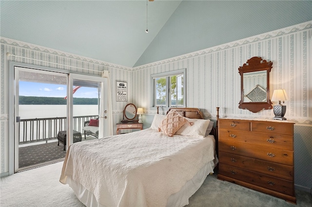 5041 Mapes Mathews Rd, Hector, NY 14818 - bedroom with carpet floors, access to exterior, vaulted ceiling, wallpapered walls, and a water view