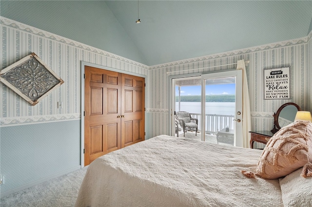 5041 Mapes Mathews Rd, Hector, NY 14818 - bedroom featuring wallpapered walls, access to exterior, a water view, lofted ceiling, and carpet floors