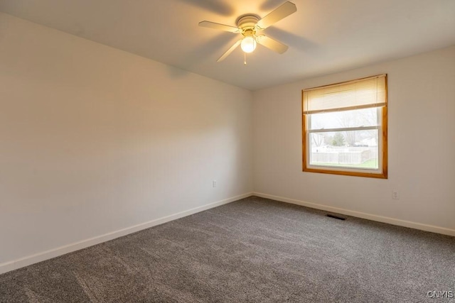 8405 Winterberry Way, Clay, NY 13090 - unfurnished room featuring ceiling fan and dark carpet