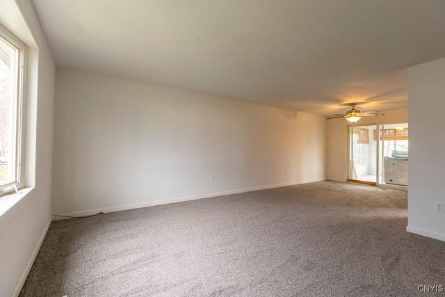 8405 Winterberry Way, Clay, NY 13090 - carpeted empty room featuring ceiling fan and baseboards