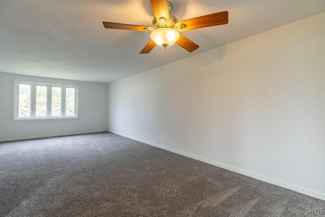 8405 Winterberry Way, Clay, NY 13090 - spare room featuring dark colored carpet and a ceiling fan