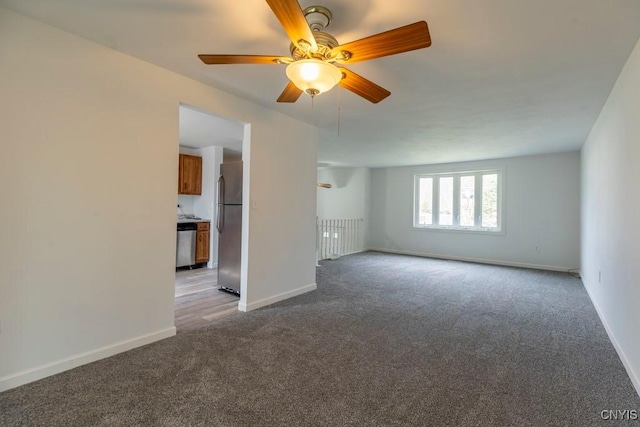 8405 Winterberry Way, Clay, NY 13090 - spare room with light carpet and ceiling fan