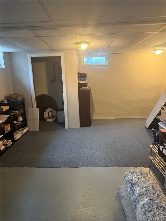 82 Winsor Cir, Elmira, NY 14905 - basement featuring carpet floors and a paneled ceiling
