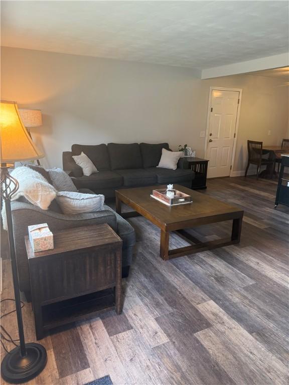 82 Winsor Cir, Elmira, NY 14905 - living area with wood finished floors and baseboards