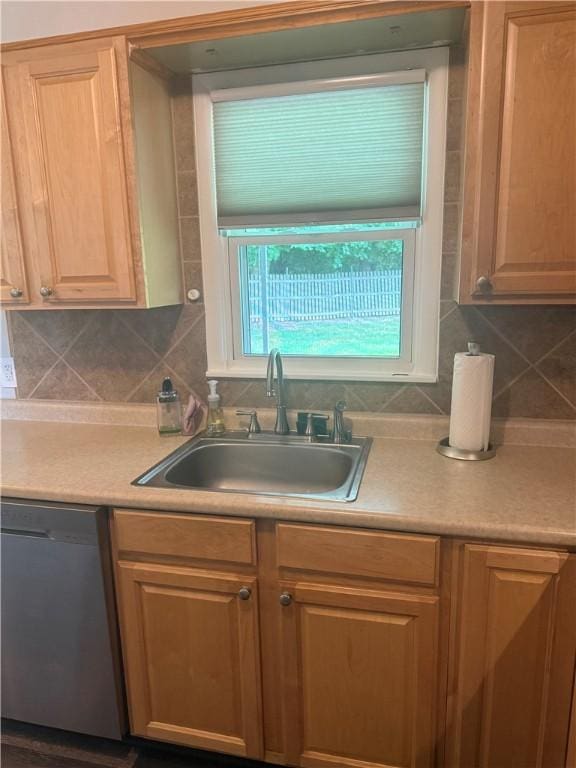 82 Winsor Cir, Elmira, NY 14905 - kitchen featuring stainless steel dishwasher, light countertops, and tasteful backsplash