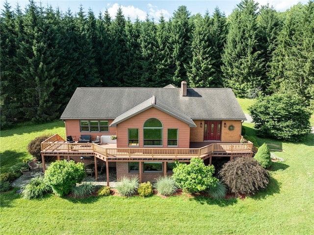 155 Hall Rd, Afton, NY 13730 - rear view of property featuring a wooden deck, a chimney, a yard, and a view of trees