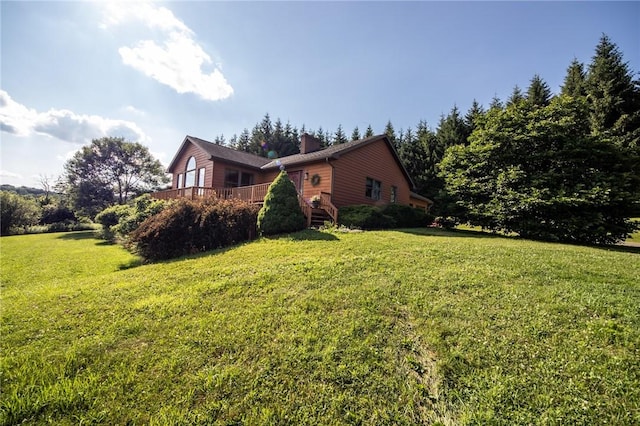 155 Hall Rd, Afton, NY 13730 - view of home's exterior with a chimney, a yard, and a deck