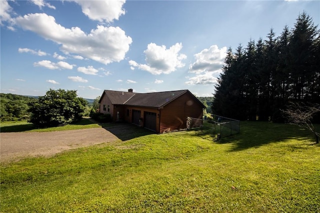 155 Hall Rd, Afton, NY 13730 - view of property exterior featuring driveway, an attached garage, and a lawn