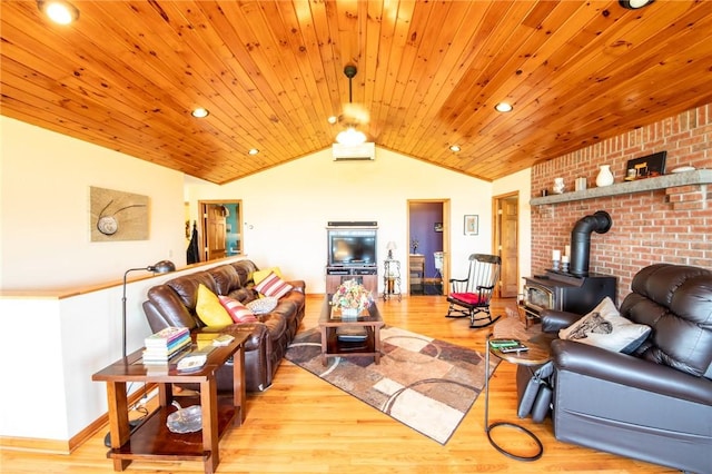 155 Hall Rd, Afton, NY 13730 - living room featuring a wood stove, vaulted ceiling, wood finished floors, and wood ceiling