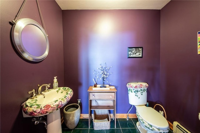 155 Hall Rd, Afton, NY 13730 - bathroom with a baseboard heating unit and tile patterned flooring