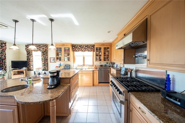 155 Hall Rd, Afton, NY 13730 - kitchen featuring appliances with stainless steel finishes, wall chimney exhaust hood, glass insert cabinets, light tile patterned floors, and an island with sink