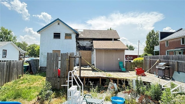 8713 Main St, Somerset, NY 14012 - rear view of house with a deck and a fenced backyard