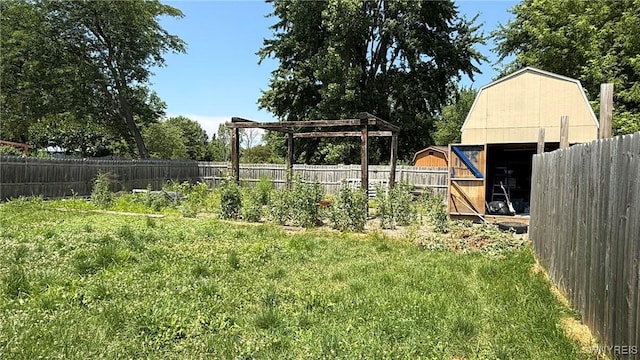 8713 Main St, Somerset, NY 14012 - fenced backyard featuring an outdoor structure and a barn