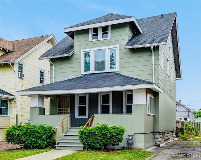 1143 Kensington Ave, Buffalo, NY 14215 - view of front of property featuring roof with shingles and a porch