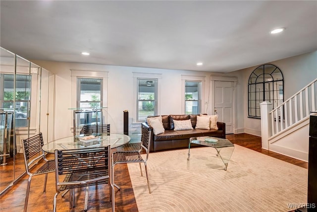 1143 Kensington Ave, Buffalo, NY 14215 - living room featuring recessed lighting, stairway, and wood finished floors