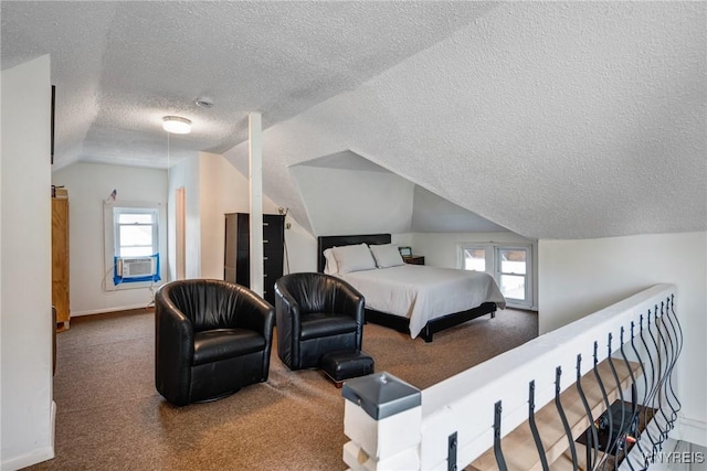 1143 Kensington Ave, Buffalo, NY 14215 - bedroom featuring carpet flooring, a textured ceiling, vaulted ceiling, multiple windows, and cooling unit