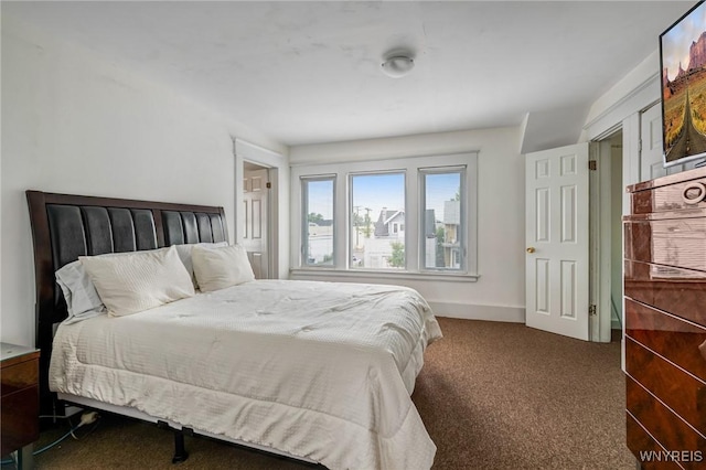 1143 Kensington Ave, Buffalo, NY 14215 - carpeted bedroom with baseboards