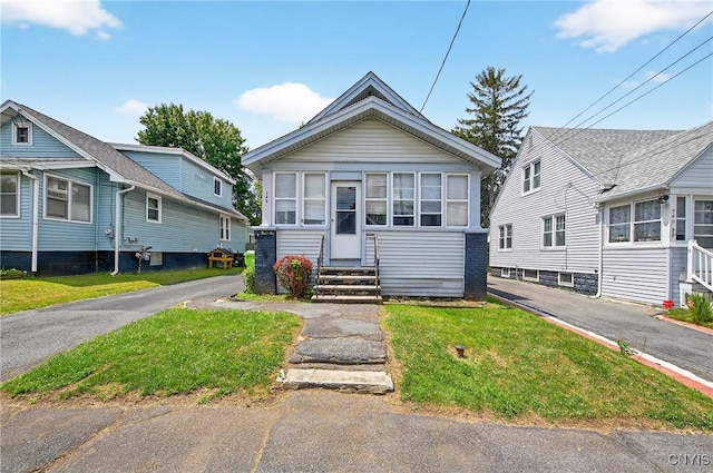 345 Wayland Rd, Salina, NY 13208 - view of front of house featuring entry steps and a front lawn
