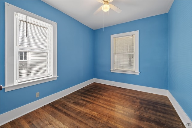 345 Wayland Rd, Salina, NY 13208 - spare room with ceiling fan and dark wood-style floors