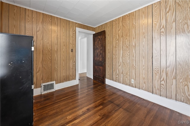 345 Wayland Rd, Salina, NY 13208 - spare room with wood finished floors, wooden walls, and crown molding