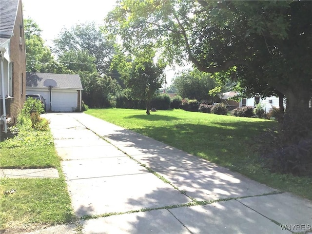 25 Fernwood Ave, West Seneca, NY 14206 - view of green lawn with a garage