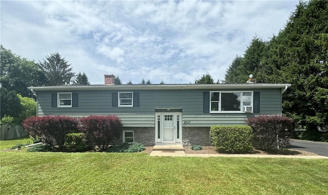 12017 Birch Dr, Corning, NY 14830 - split foyer home with a chimney and a front yard