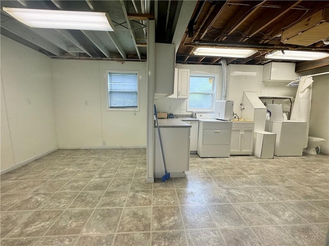 12017 Birch Dr, Corning, NY 14830 - basement featuring washer and clothes dryer