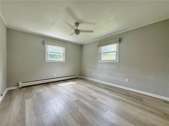 12017 Birch Dr, Corning, NY 14830 - empty room with a baseboard heating unit, healthy amount of natural light, a ceiling fan, wood finished floors, and ornamental molding