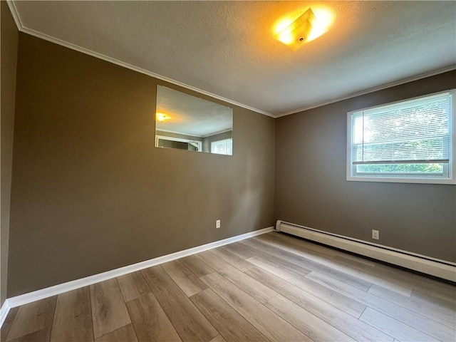 12017 Birch Dr, Corning, NY 14830 - unfurnished room featuring a baseboard radiator, ornamental molding, wood finished floors, and a textured ceiling