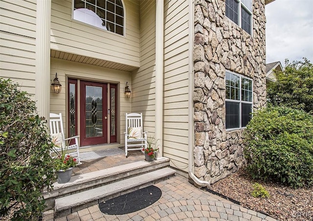 7991 Austrian Pine Cir, Pompey, NY 13104 - property entrance with stone siding