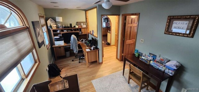 239 Bullis Rd, West Seneca, NY 14224 - home office with light wood finished floors, plenty of natural light, and a ceiling fan