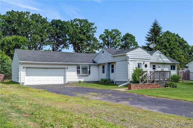 5910 Edgewood Dr, Niagara, NY 14304 - ranch-style home with a garage and asphalt driveway