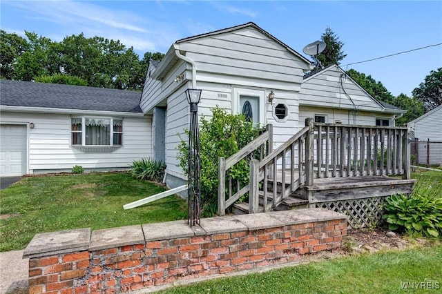 5910 Edgewood Dr, Niagara, NY 14304 - view of front of home featuring a front yard and a garage