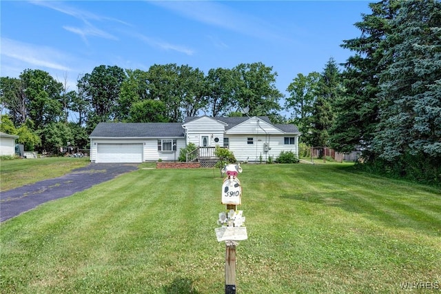 5910 Edgewood Dr, Niagara, NY 14304 - single story home featuring driveway, an attached garage, and a front lawn