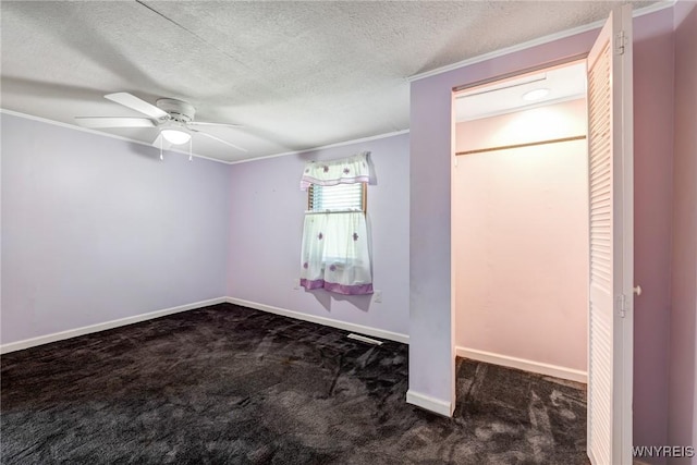 5910 Edgewood Dr, Niagara, NY 14304 - unfurnished bedroom with carpet, ornamental molding, a textured ceiling, and a ceiling fan
