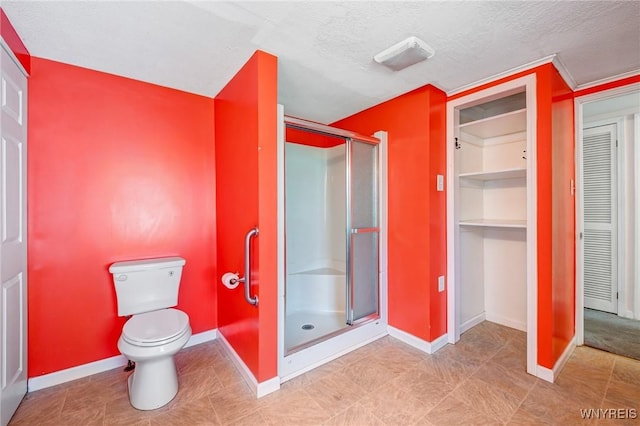 5910 Edgewood Dr, Niagara, NY 14304 - full bathroom featuring a closet, a shower stall, and a textured ceiling