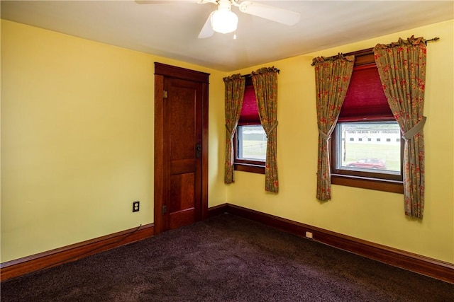 1995 Grand Central Ave, Horseheads, NY 14845 - empty room featuring dark carpet and ceiling fan