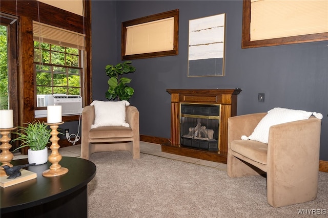 2912 Eggert Rd, Tonawanda, NY 14150 - sitting room with cooling unit, a fireplace with flush hearth, and carpet flooring