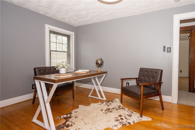 2912 Eggert Rd, Tonawanda, NY 14150 - office with wood finished floors and a textured ceiling