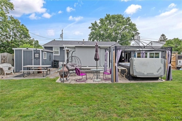 511 Drexler St, Salina, NY 13088 - back of house with a patio area, a storage shed, and a gazebo