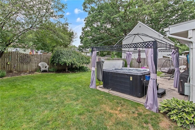 511 Drexler St, Salina, NY 13088 - fenced backyard with a hot tub and a gazebo