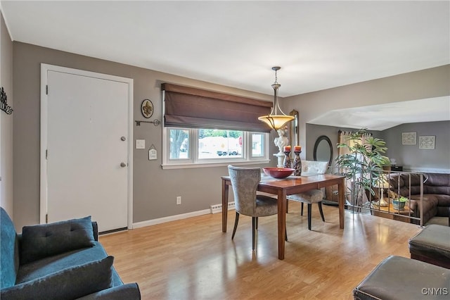 511 Drexler St, Salina, NY 13088 - dining room featuring light wood-style floors and baseboard heating