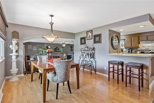 511 Drexler St, Salina, NY 13088 - dining area featuring light wood finished floors, a ceiling fan, and recessed lighting
