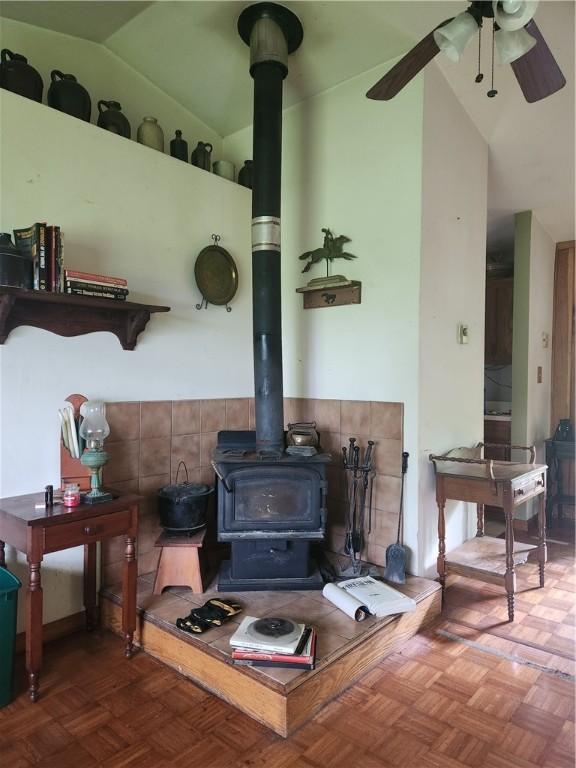 142 John Smith Rd, Pharsalia, NY 13844 - detailed view of a wood stove and ceiling fan