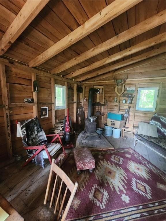 142 John Smith Rd, Pharsalia, NY 13844 - living area with a wood stove, wood ceiling, and wood walls