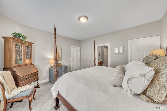 9443 Heritage Path Unit B, Clarence, NY 14032 - bedroom featuring light carpet and ensuite bathroom